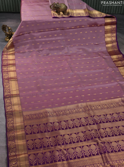 Kanchipuram silk saree pastel purple and purple with allover zari woven buttas and rich zari woven border