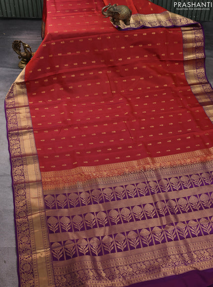Kanchipuram silk saree rustic orange and purple with allover zari woven buttas and zari woven border