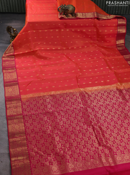 Kanchipuram silk saree orange and pink with allover zari woven buttas and temple zari woven border