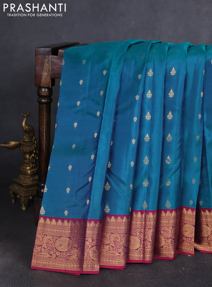 Kanchipuram silk saree peacock green and wine shade with allover zari woven buttas and temple zari woven border
