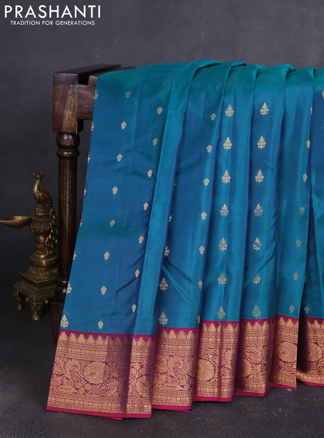 Kanchipuram silk saree peacock green and wine shade with allover zari woven buttas and temple zari woven border