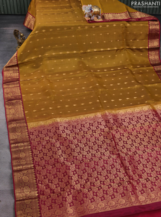 Kanchipuram silk saree mustard yellow and wine shade with allover zari woven buttas and temple zari woven border
