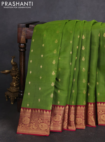 Kanchipuram silk saree light green and maroon with allover zari woven buttas and temple zari woven border