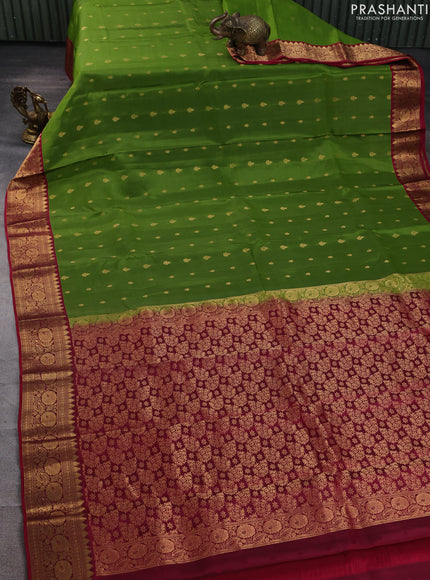Kanchipuram silk saree light green and maroon with allover zari woven buttas and temple zari woven border