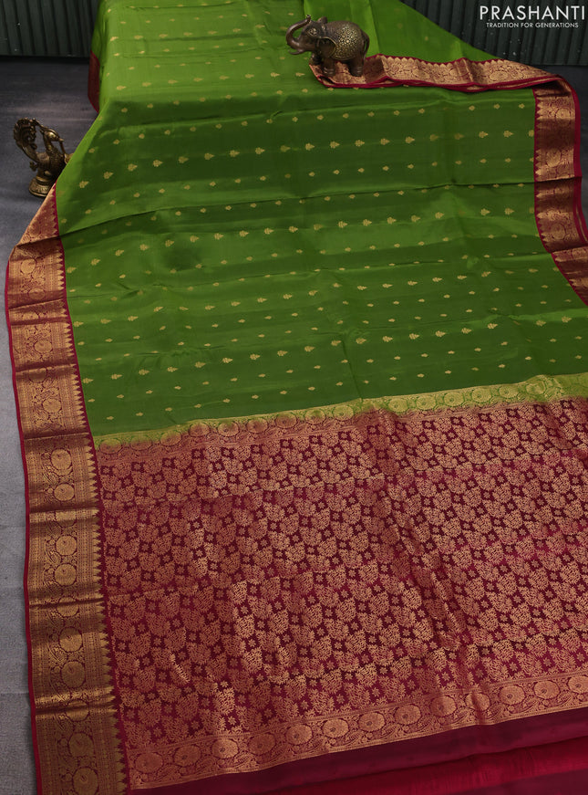 Kanchipuram silk saree light green and maroon with allover zari woven buttas and temple zari woven border