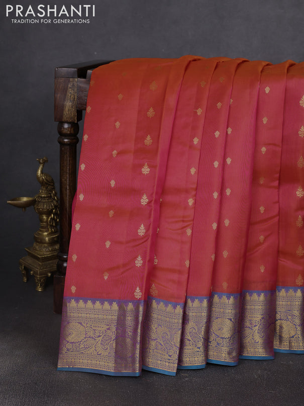 Kanchipuram silk saree orange and peacock green with allover zari woven buttas and zari woven border
