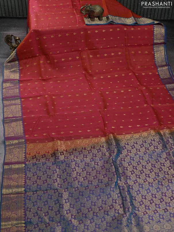 Kanchipuram silk saree orange and peacock green with allover zari woven buttas and zari woven border
