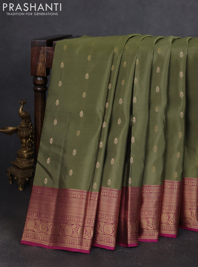 Kanchipuram silk saree pastel green and magenta pink with allover zari woven buttas and zari woven border