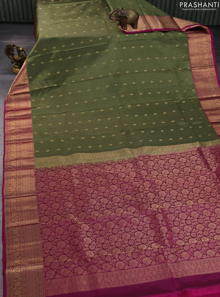 Kanchipuram silk saree pastel green and magenta pink with allover zari woven buttas and zari woven border
