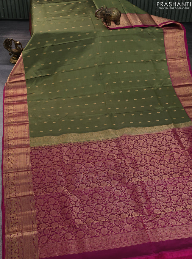 Kanchipuram silk saree pastel green and magenta pink with allover zari woven buttas and zari woven border