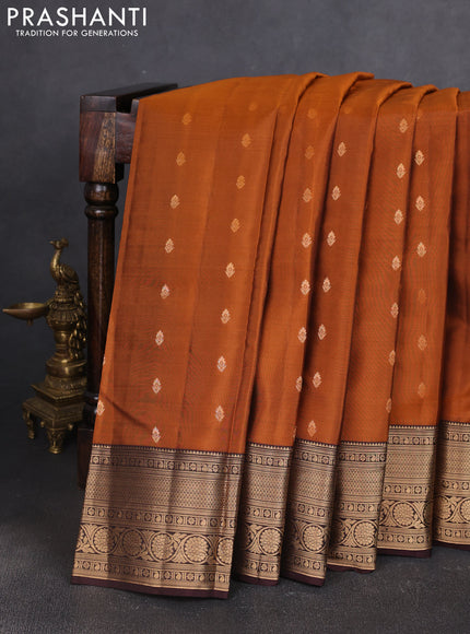 Kanchipuram silk saree rustic orange and coffee brown with allover zari woven buttas and zari woven border