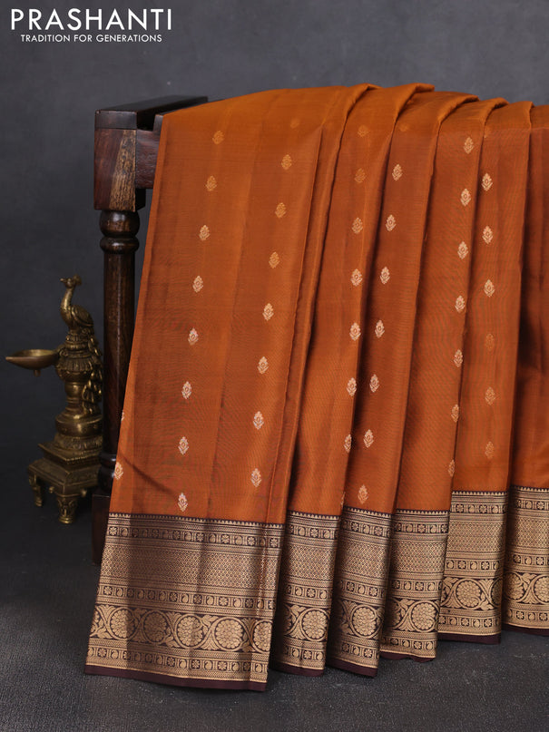 Kanchipuram silk saree rustic orange and coffee brown with allover zari woven buttas and zari woven border