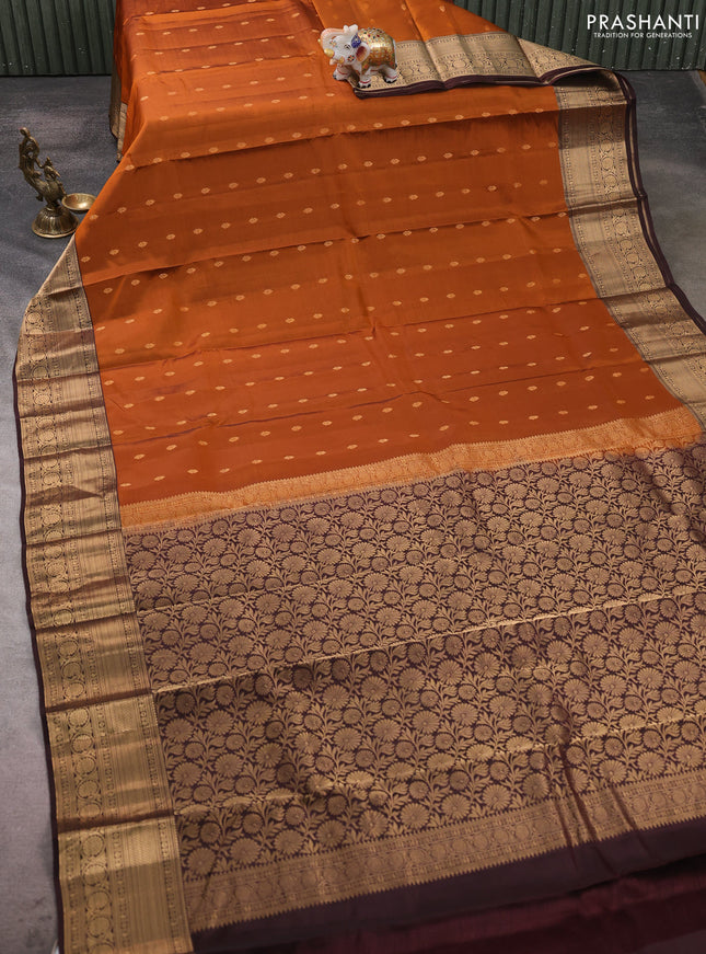 Kanchipuram silk saree rustic orange and coffee brown with allover zari woven buttas and zari woven border