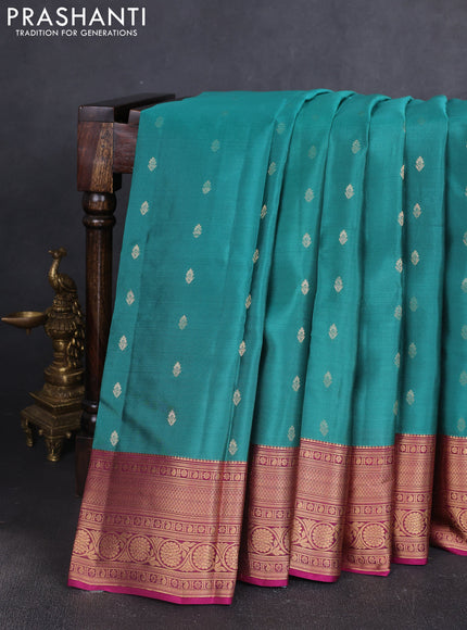 Kanchipuram silk saree green shade and magenta pink with allover zari woven buttas and zari woven border