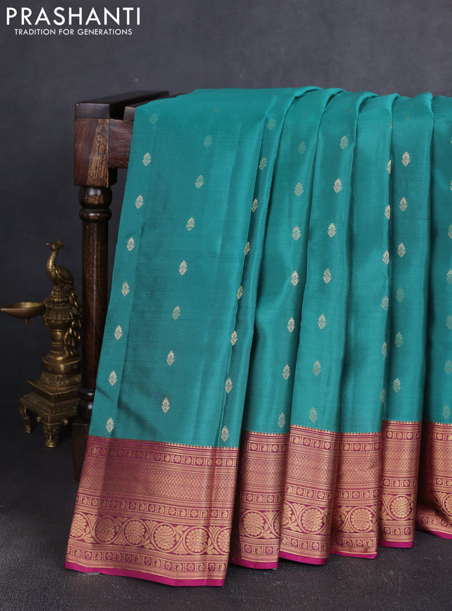Kanchipuram silk saree green shade and magenta pink with allover zari woven buttas and zari woven border