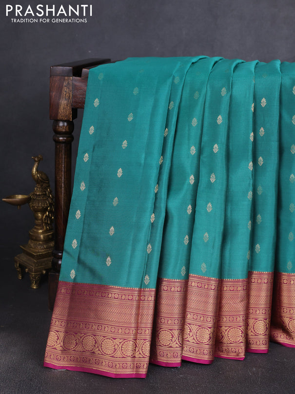 Kanchipuram silk saree green shade and magenta pink with allover zari woven buttas and zari woven border