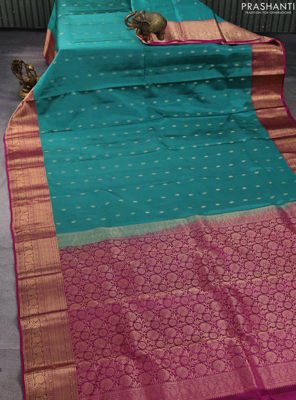 Kanchipuram silk saree green shade and magenta pink with allover zari woven buttas and zari woven border