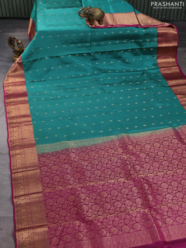 Kanchipuram silk saree green shade and magenta pink with allover zari woven buttas and zari woven border