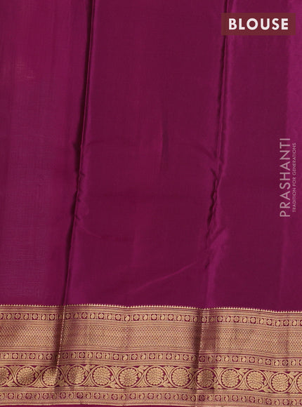 Kanchipuram silk saree green shade and magenta pink with allover zari woven buttas and zari woven border