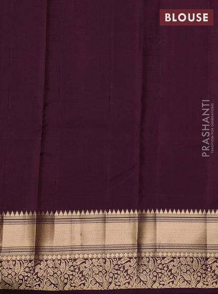 Kanchipuram silk saree dark mustard and wine shade with allover zari woven buttas and rich zari woven border