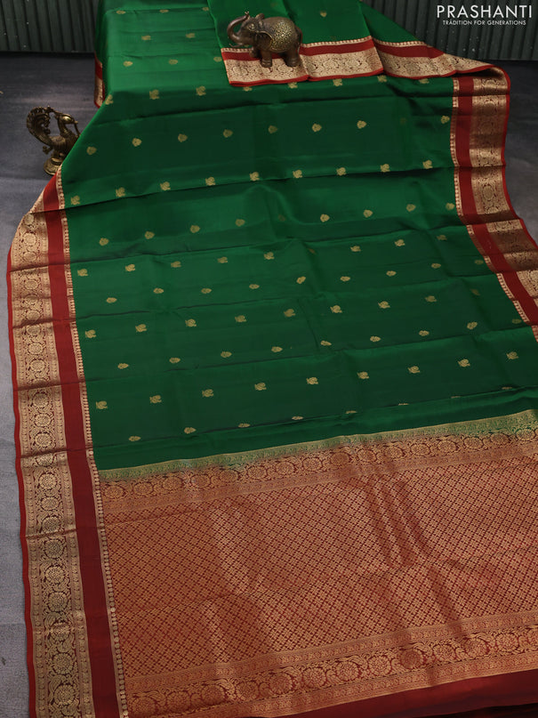 Kanchipuram silk saree green and rust shade with allover zari woven buttas and rettapet zari woven border