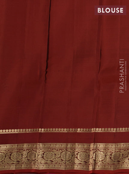 Kanchipuram silk saree green and rust shade with allover zari woven buttas and rettapet zari woven border