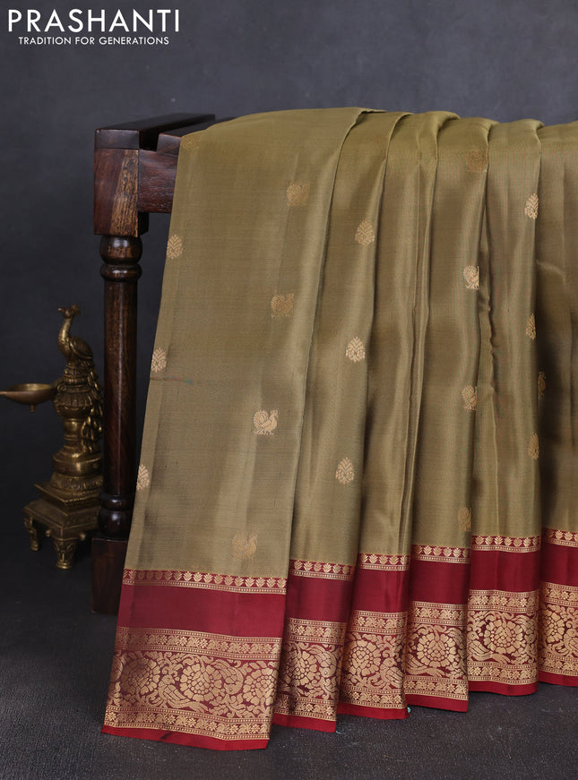 Kanchipuram silk saree elachi green and maroon with allover zari woven buttas and rettapet zari woven border