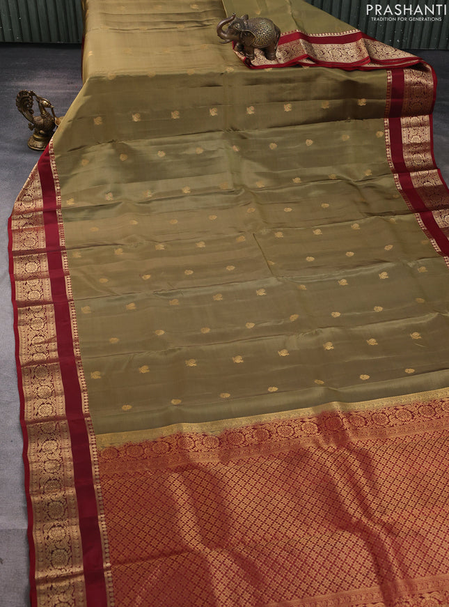 Kanchipuram silk saree elachi green and maroon with allover zari woven buttas and rettapet zari woven border