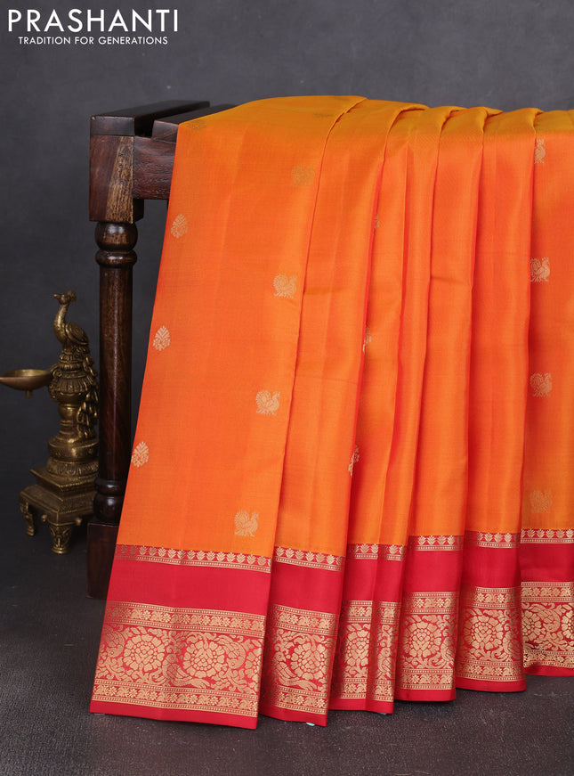 Kanchipuram silk saree orange and red with allover zari woven buttas and rettapet zari woven border