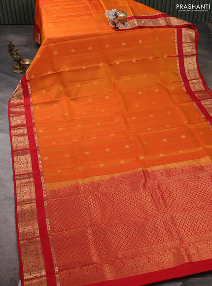 Kanchipuram silk saree orange and red with allover zari woven buttas and rettapet zari woven border