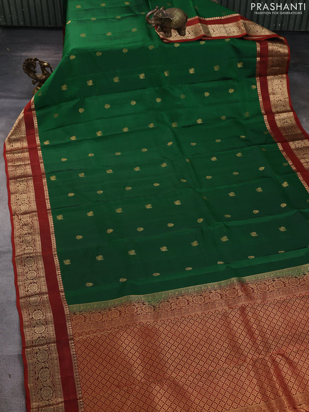 Kanchipuram silk saree green and rust shade with allover zari woven buttas and rettapet zari woven border