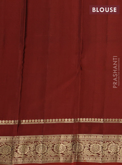 Kanchipuram silk saree green and rust shade with allover zari woven buttas and rettapet zari woven border