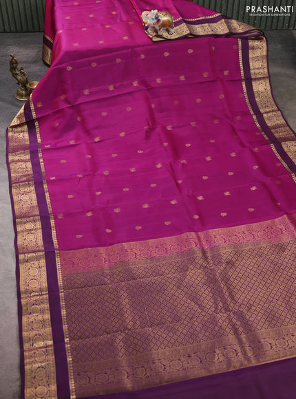 Kanchipuram silk saree magenta pink and wine shade with allover zari woven buttas and rettapet zari woven border