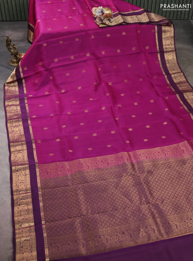 Kanchipuram silk saree magenta pink and wine shade with allover zari woven buttas and rettapet zari woven border