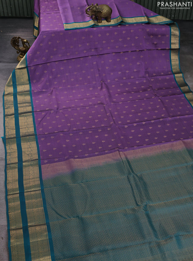 Kanchipuram silk saree purple and peacock green with allover zari woven buttas and rettapet zari woven border
