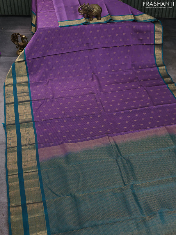 Kanchipuram silk saree purple and peacock green with allover zari woven buttas and rettapet zari woven border