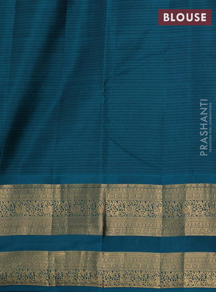 Kanchipuram silk saree purple and peacock green with allover zari woven buttas and rettapet zari woven border