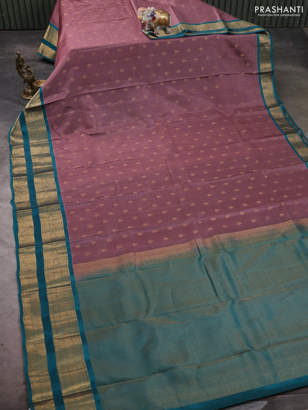 Kanchipuram silk saree mauve pink and peacock green with allover zari woven buttas and rettapet zari woven border