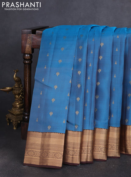 Kanchipuram silk saree peacock blue and coffee brown with allover zari woven buttas and zari woven border
