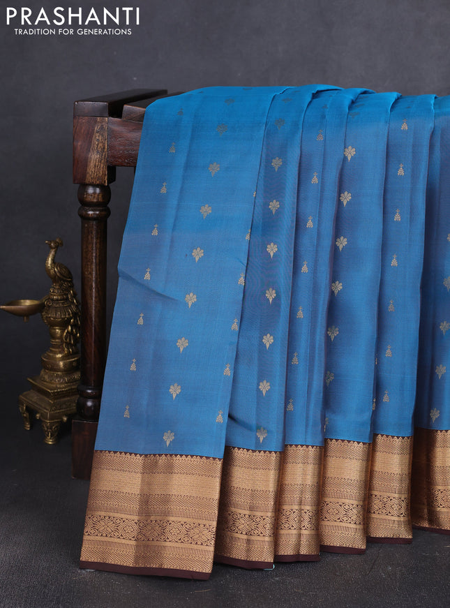 Kanchipuram silk saree peacock blue and coffee brown with allover zari woven buttas and zari woven border