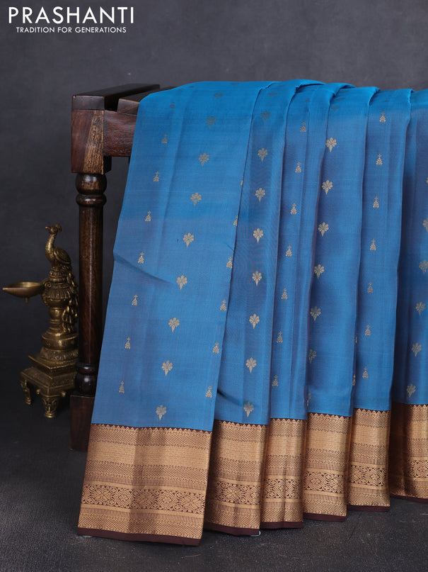 Kanchipuram silk saree peacock blue and coffee brown with allover zari woven buttas and zari woven border