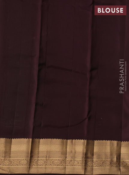 Kanchipuram silk saree green and coffee brown with allover zari woven buttas and zari woven border