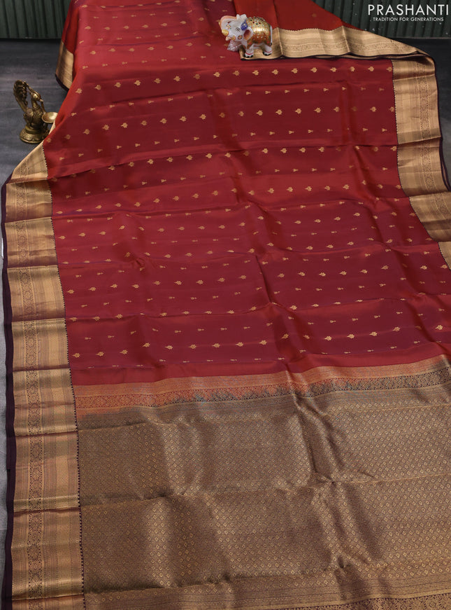 Kanchipuram silk saree rustic orange and coffee brown with allover zari woven buttas and zari woven border