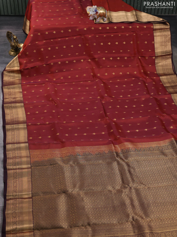 Kanchipuram silk saree rustic orange and coffee brown with allover zari woven buttas and zari woven border