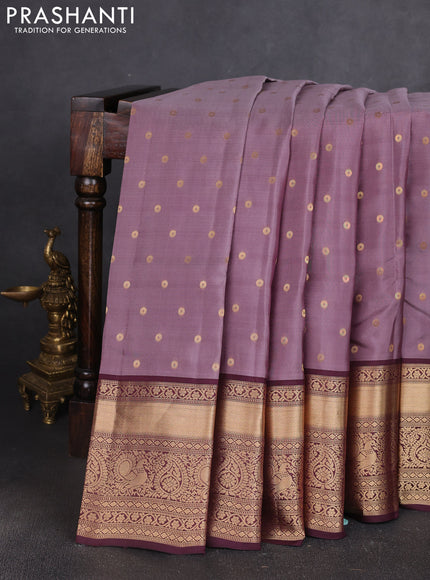 Kanchipuram silk saree rosy brown and wine shade with allover zari woven buttas and long zari woven border