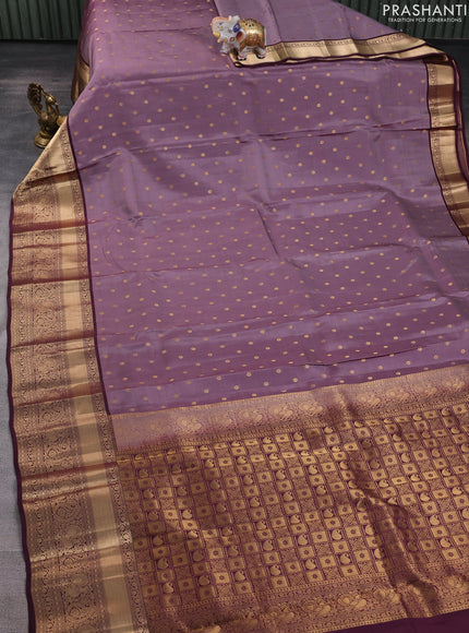 Kanchipuram silk saree rosy brown and wine shade with allover zari woven buttas and long zari woven border