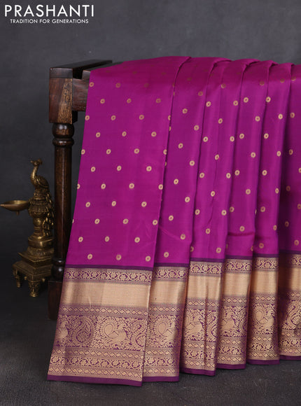 Kanchipuram silk saree purple and dark purple with allover zari woven buttas and long zari woven border