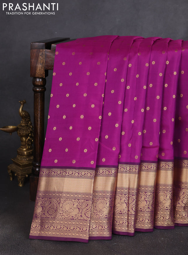 Kanchipuram silk saree purple and dark purple with allover zari woven buttas and long zari woven border