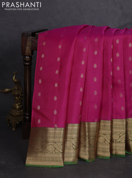 Kanchipuram silk saree pink and green with allover zari woven buttas and zari woven border