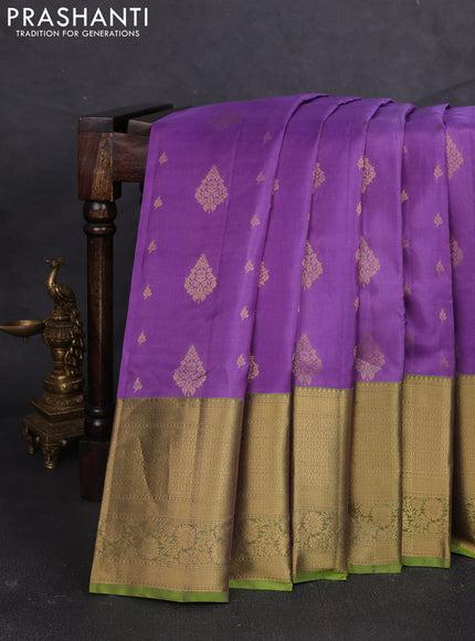 Kanchipuram silk saree lavender and light green with allover zari woven buttas and long zari woven border